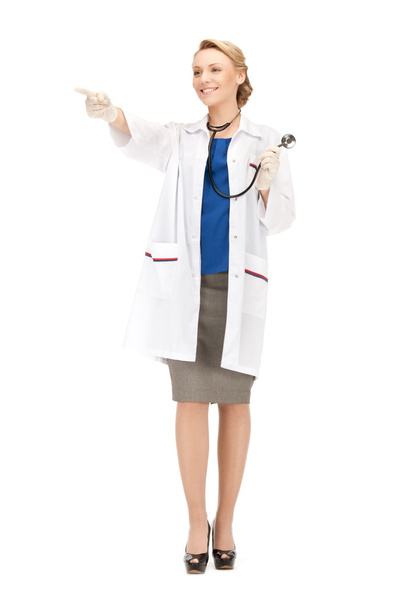 Attractive female doctor pointing her finger - 写真・画像