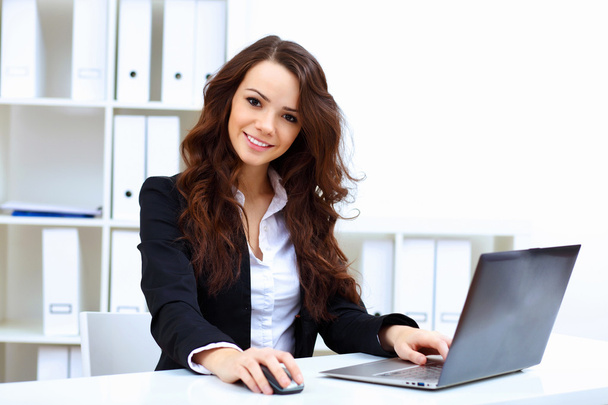 Young busines woman with notebook - Foto, imagen