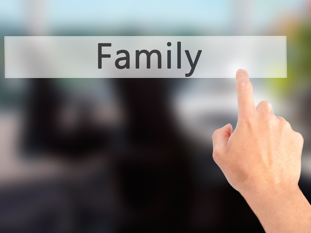 Rodina - ručně stisknutím tlačítka na rozmazané pozadí konceptu na - Fotografie, Obrázek