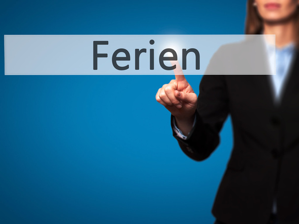 Ferien (Vacaciones en alemán) - Empresaria pulsando el botón de mano
 - Foto, imagen