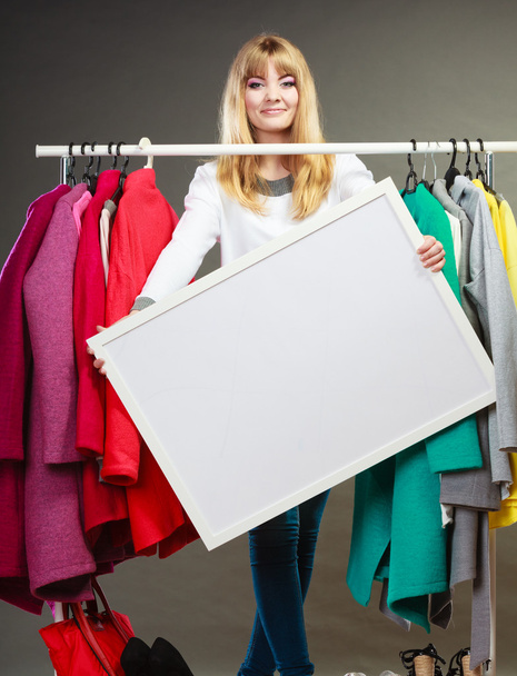 Woman in mall wardrobe with blank banner copyspace - Photo, Image