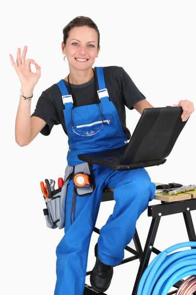 Female plumber giving it the OK - Foto, Imagem