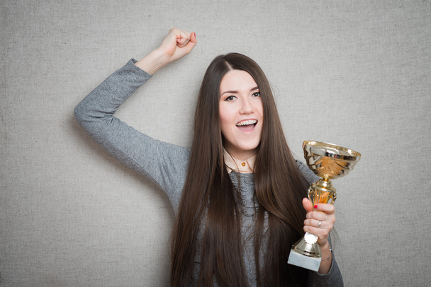 woman winning a trophy - Photo, image