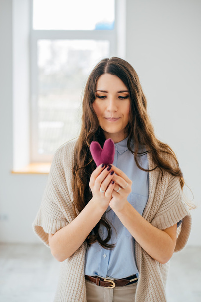 woman holding toy heart - Photo, Image