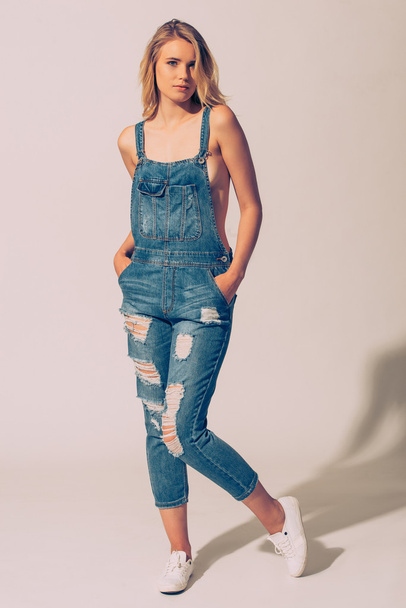 beautiful young woman wearing jeans - 写真・画像