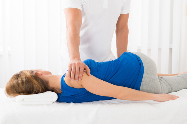 Masseur Doing Massage On Woman - 写真・画像