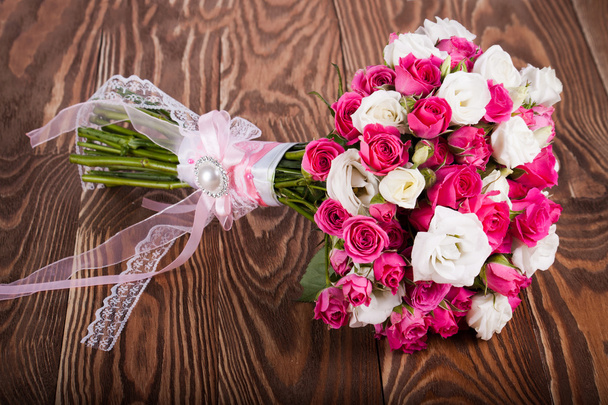 Wedding bouquet on the boards - Foto, Imagen