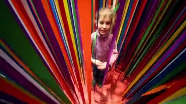Girl goes back through ribbons - Video