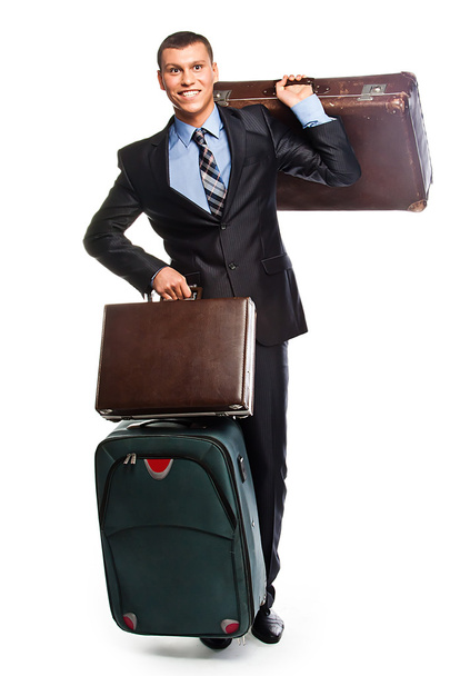 Young businessman with three suitcases - Φωτογραφία, εικόνα