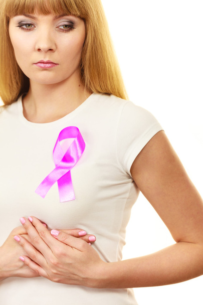Woman sad girl wih pink cancer ribbon on chest  - Foto, Imagen