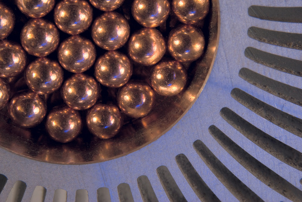 ラジエーターの小さな黄金金属磁気ボール - 写真・画像