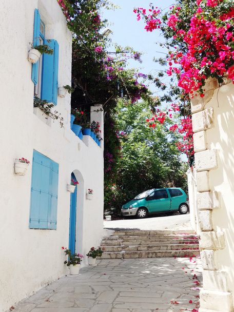 traditional street among bougainvillaea in Greece  - Photo, Image