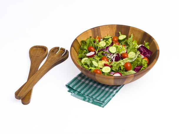 Green salad with tongs - Фото, изображение