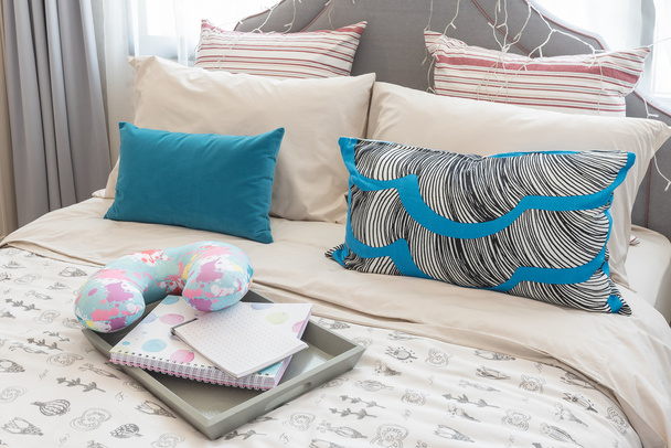 colorful pillows on bed in luxury girl's bedroom  - Photo, Image