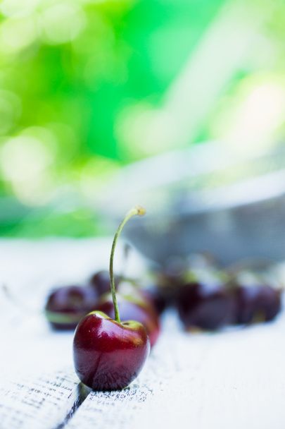 Cherry on the rustic wooden background - Фото, зображення
