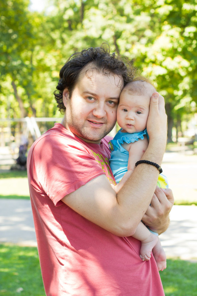 vader en baby - Foto, afbeelding