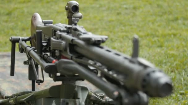 Black heavy machine gun in the field - Footage, Video