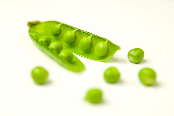 Pea pod and pea seeds on white - Photo, Image