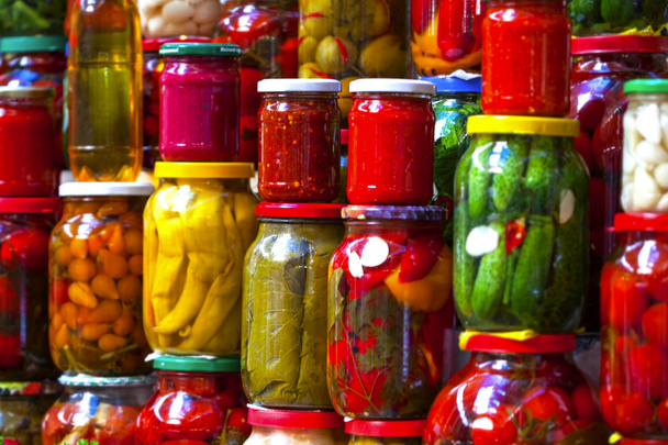 Preserved vegetables in glass jars - Foto, Bild
