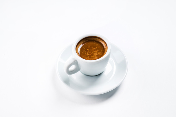cup of coffee on plate - Valokuva, kuva