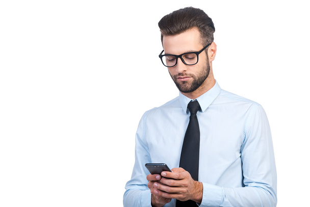 man in shirt and tie holding mobile phone - Foto, Imagem