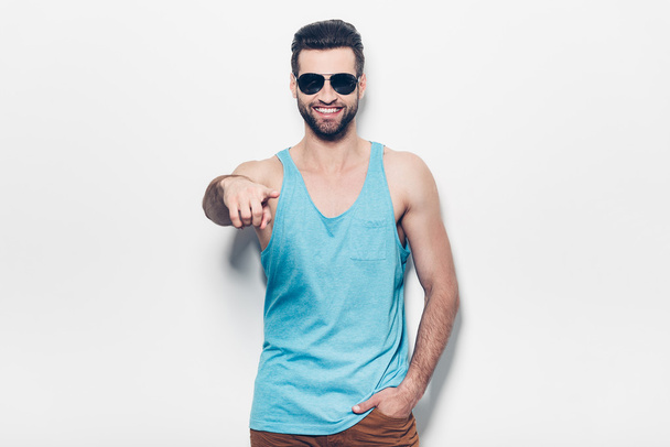 man in sunglasses pointing you and smiling - Φωτογραφία, εικόνα