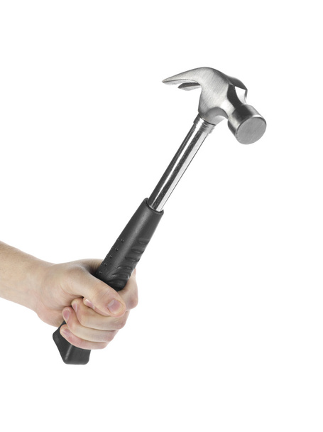Human hand holding a hammer - Foto, afbeelding