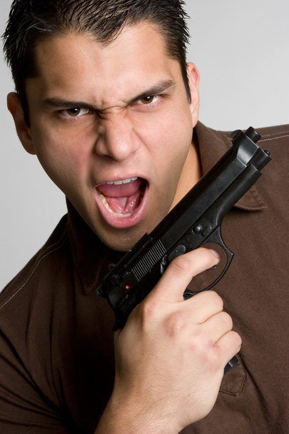 zły człowiek z pistoletu - Zdjęcie, obraz