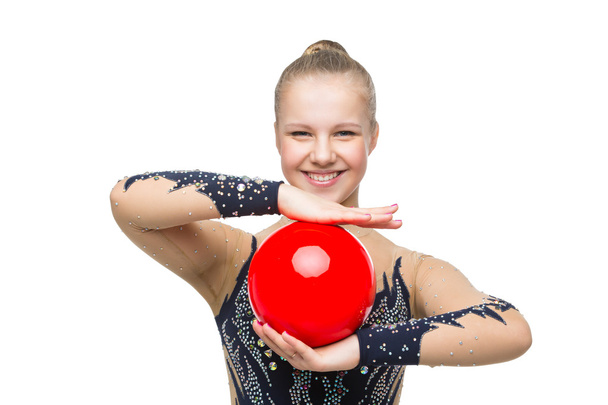Bella ginnasta ragazza con palla rossa
 - Foto, immagini