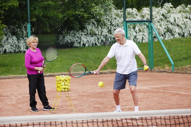  coach training with elderly woman.  - Photo, image