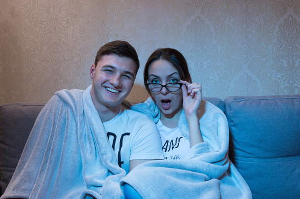 Attractive and excited young boy and girl in glasses snuggling u - Foto, Imagen