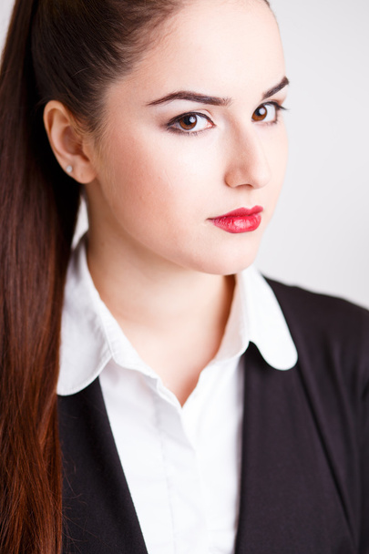 portrait of Young business woman in a suit with perfect makeup and hair style - Valokuva, kuva