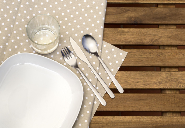  plate with silver cutlery on - Φωτογραφία, εικόνα