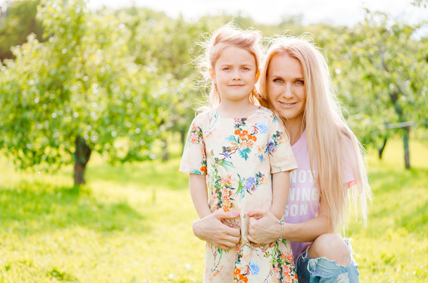 Mother and daughter outdoors - Photo, Image