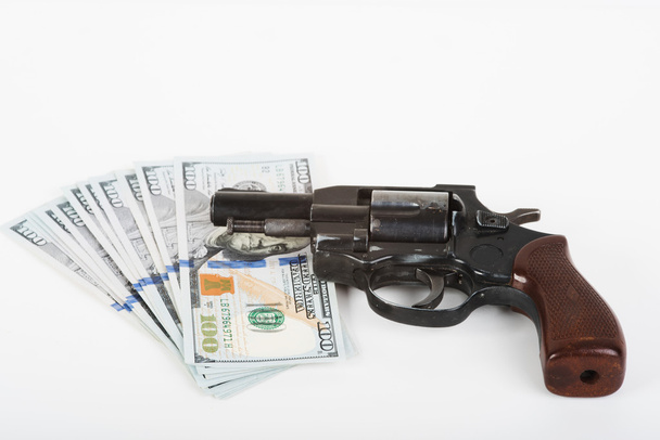 Bilincs, a pénz és a pisztoly. - Fotó, kép