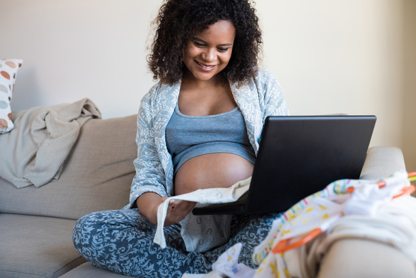 Pregnant woman shopping online - Photo, Image