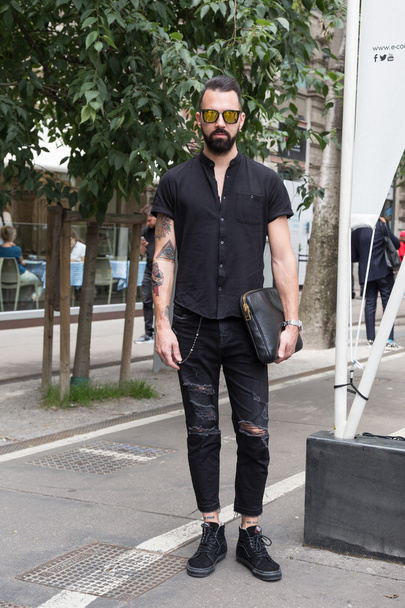 Fashionable man posig during Milan Men's Fashion Week - Fotó, kép