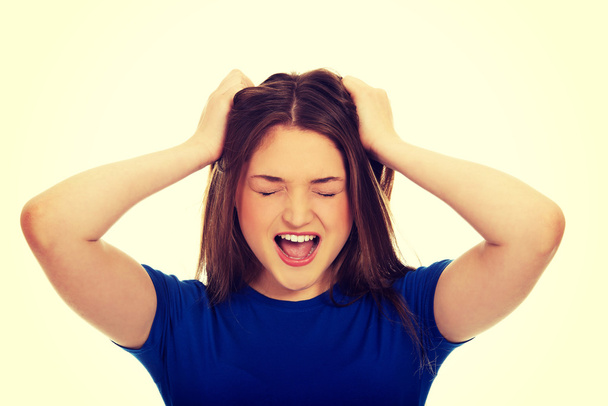 Frustrated young woman screaming. - Фото, изображение