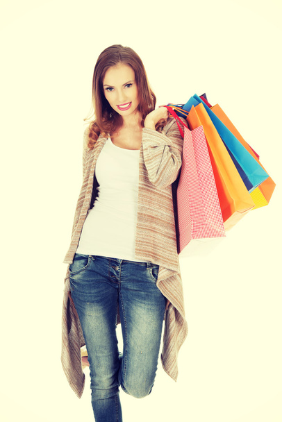 Happy woman with shopping bags. - Zdjęcie, obraz