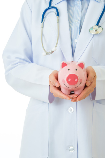 medical insurance, piggybank with stethoscope - Фото, зображення