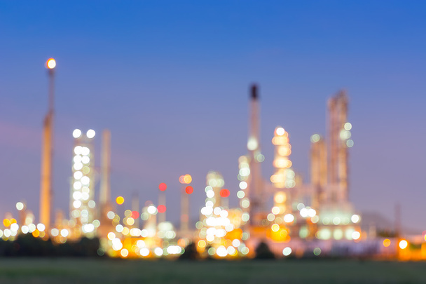 Bokeh van olie raffinaderij plant bij avondschemering, Blur achtergrond. - Foto, afbeelding