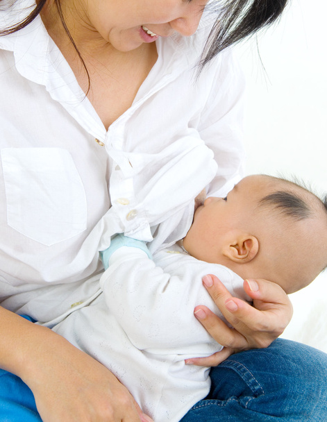 Asian mother breastfeeding - Fotoğraf, Görsel