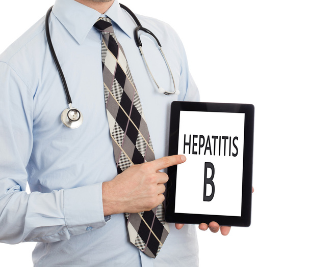 Arzt hält Tablette - Hepatitis B - Foto, Bild
