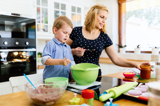 Mother and child preparing cookies - Photo, Image