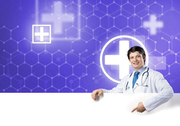 Doctor with white blank banner - Zdjęcie, obraz
