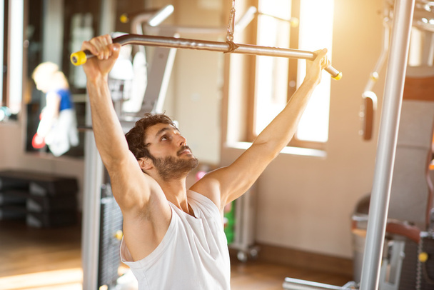 Man training in gym - Photo, image