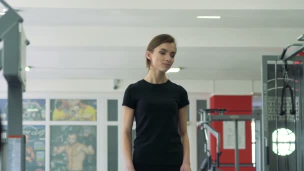 Beautiful girl dancing in the gym. Slowly - Footage, Video