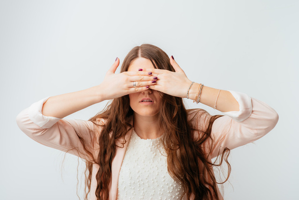 woman covering her eyes  - Photo, image