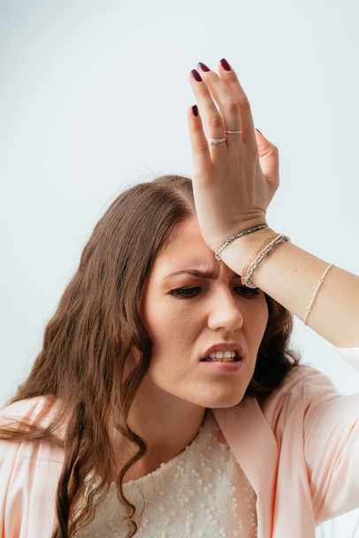young  woman has a headache  - Фото, зображення