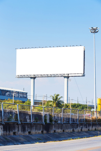 Blank billboard on blue sky - Photo, Image